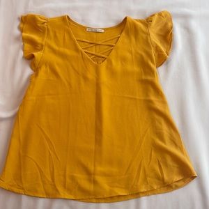 Criss-cross V-neck ruffle sleeve tank